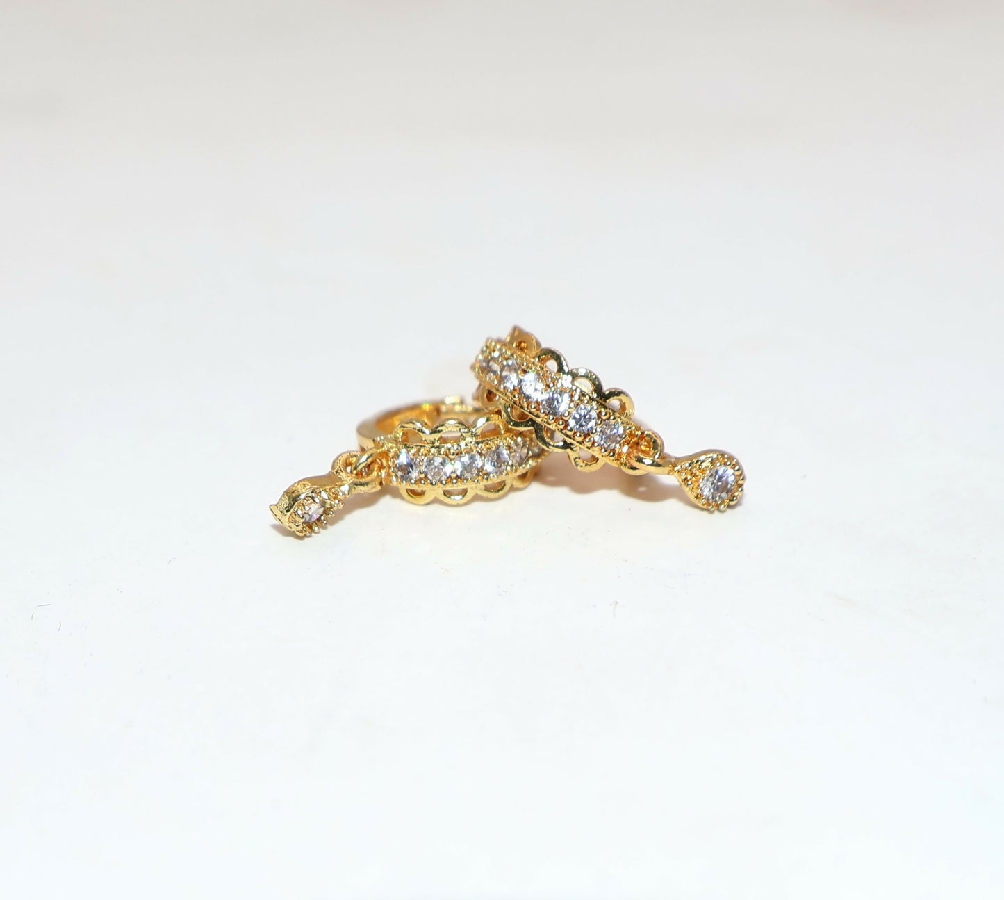 Gold Plated AD Bali Triple Dangler Huggie Hoop Earrings kan ki Bali Combo Pack of 2