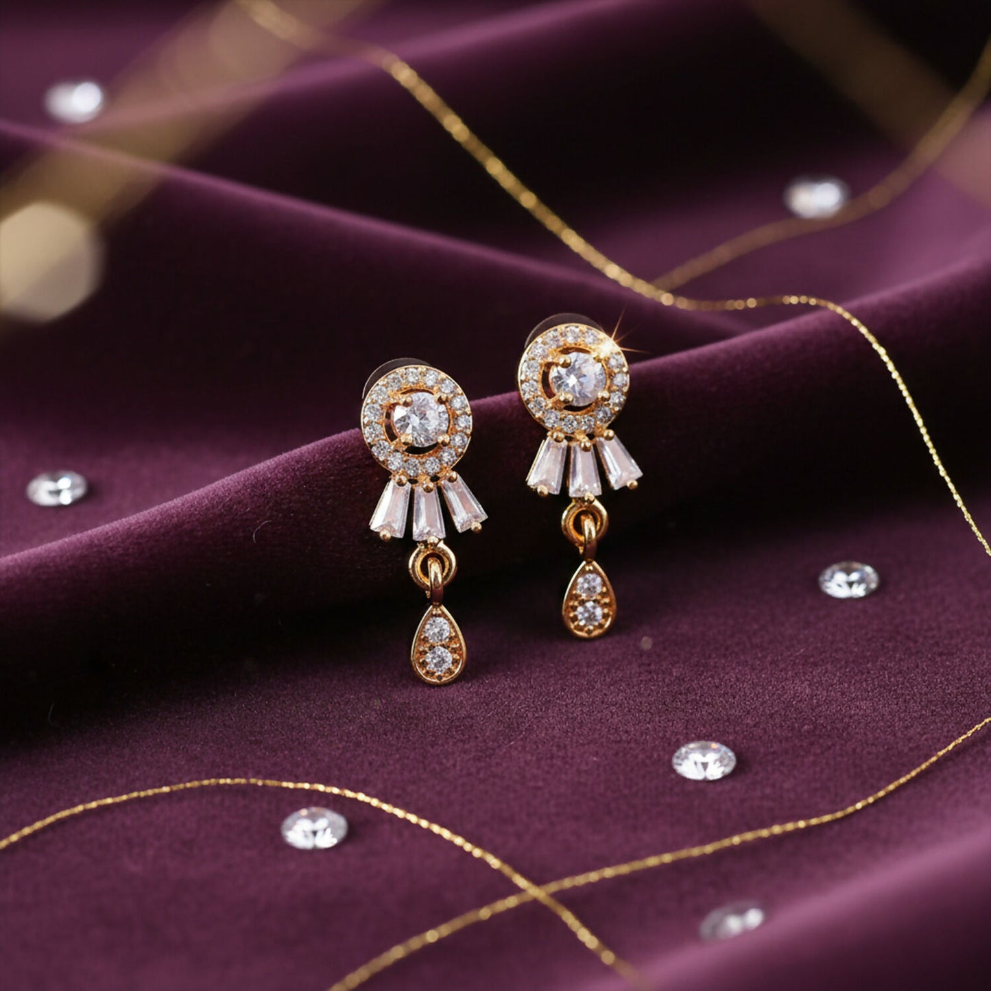 Side profile of lightweight gold plated CZ stud drop earrings for women