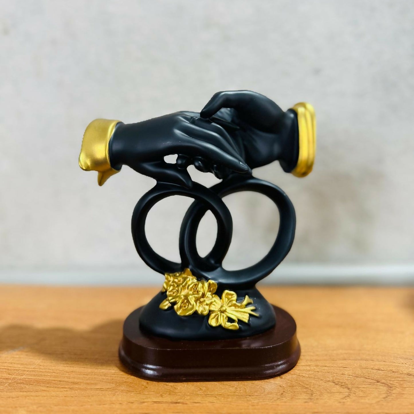 Luxury Black & Gold Handshake Figurine with Interlocked Rings & Floral Base | Romantic Couple Holding Hands Showpiece for Home Décor, Wedding Gift, Anniversary Gift, Office Desk & Living Room Decoration