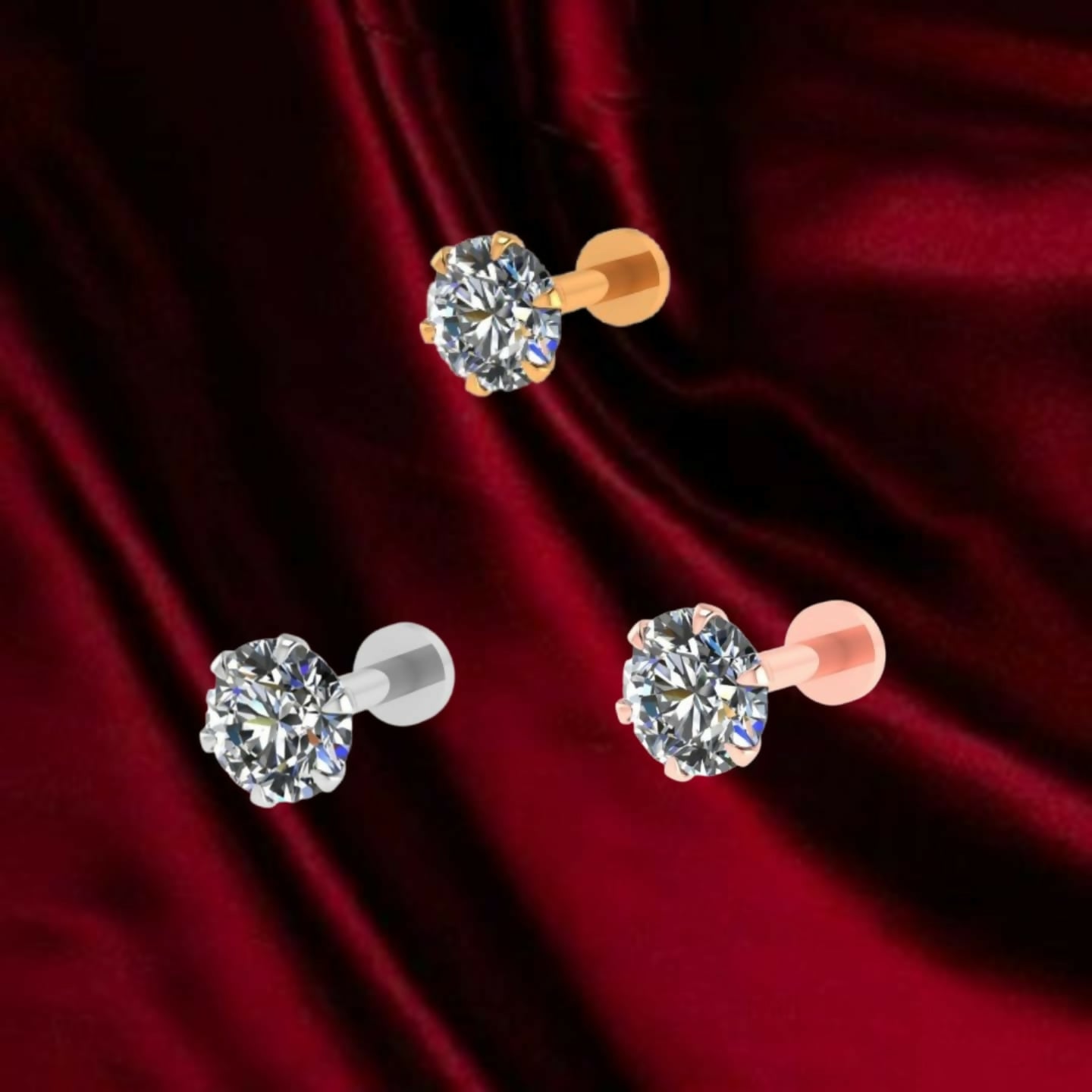 Close-up of gold and silver labret stud nosepins featuring cubic zirconia stones