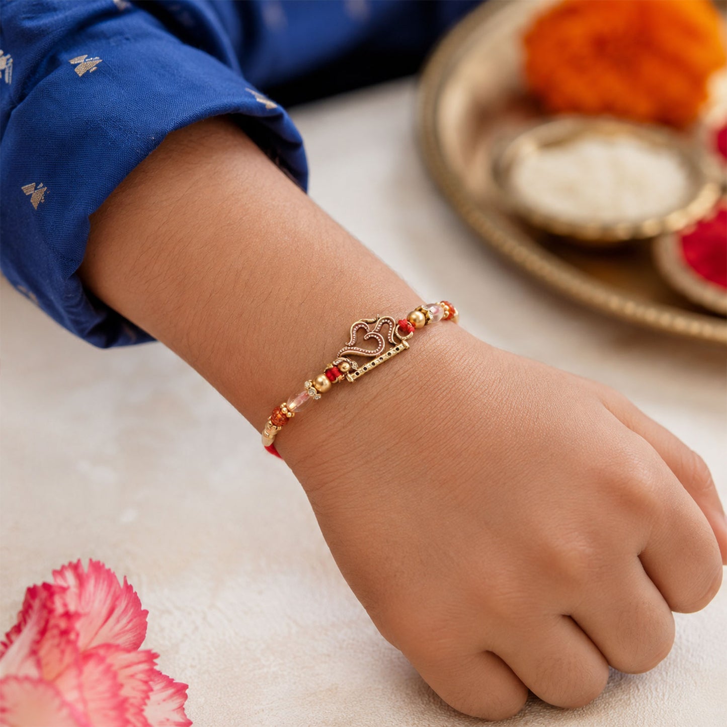 Om and Flute Pendant Rakhi with Rudraksha Beads