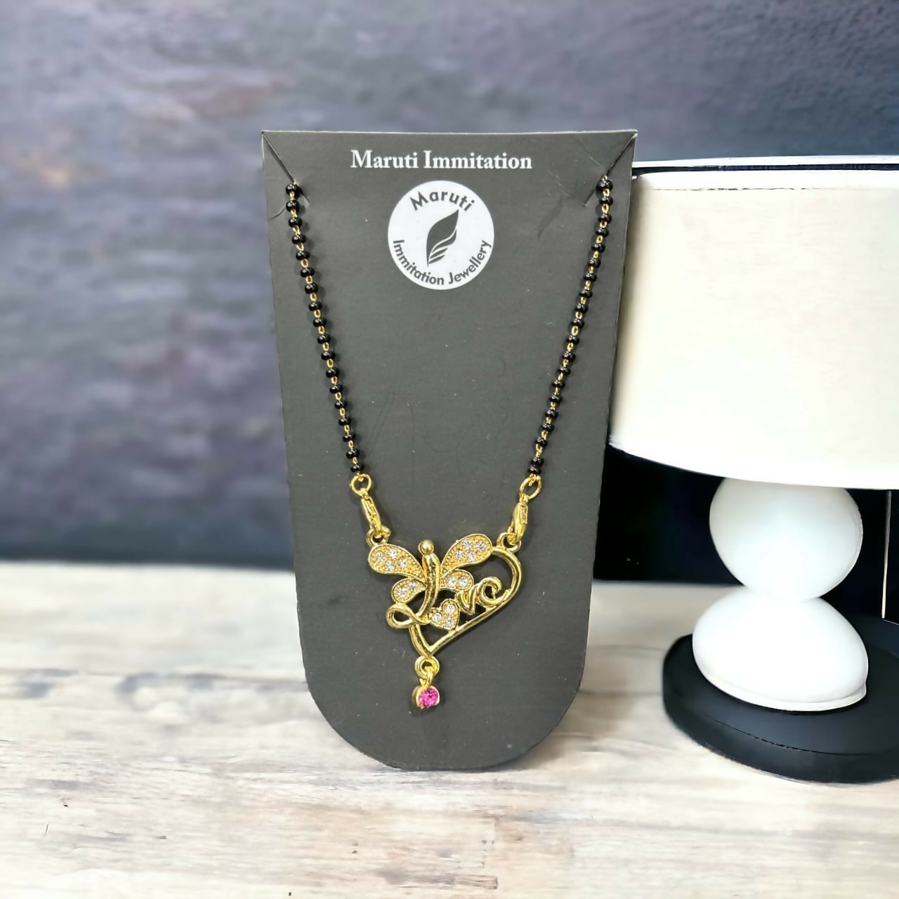 The Butterfly & Heart Design Magalsuta. Imitation jewellery finished with gold tone, and stunning craftsmanship.