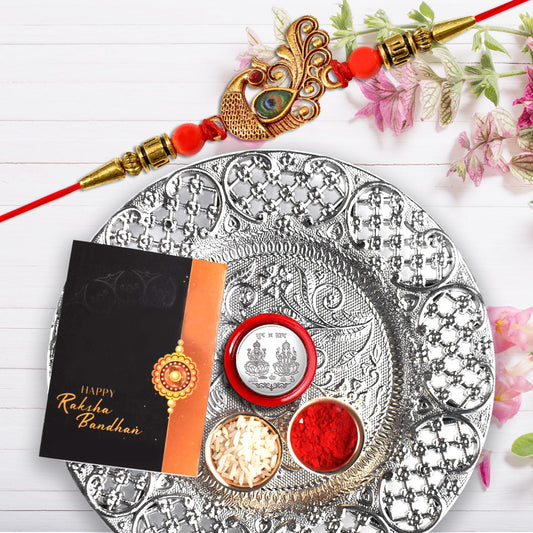 Peacock design rakhi with silver colour decorative puja thali in festive gift set