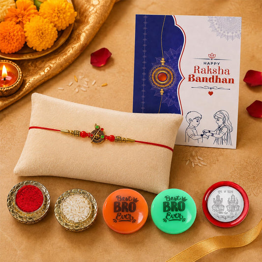 Flute design Rakhi Set for Brother with roli chawal and silver pooja coin for Raksha Bandhan.
