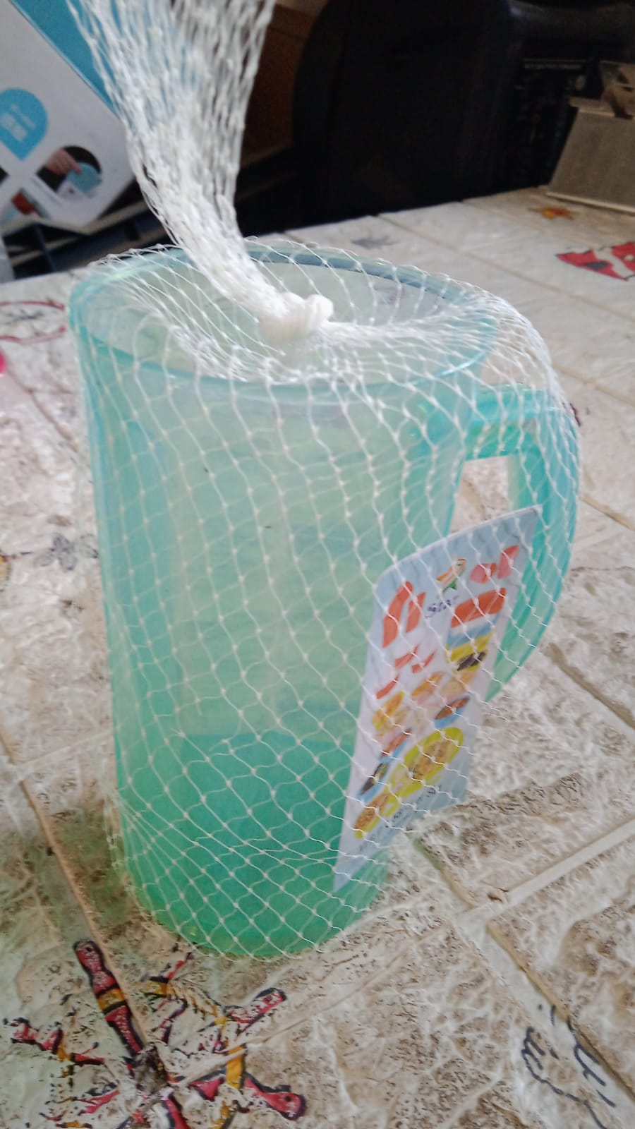 Clear plastic beverage mug, front view
