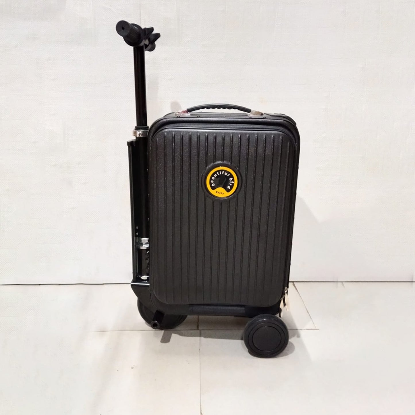 Black trolley bag showcasing durability and foldable scooter design