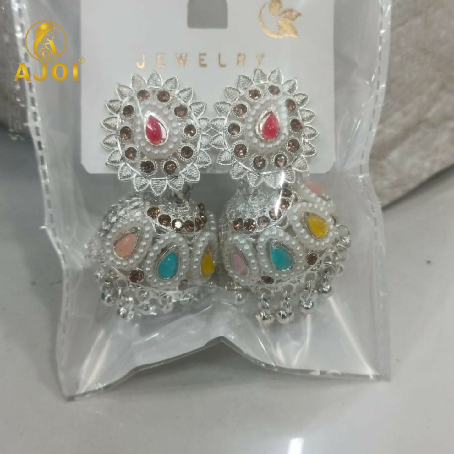 Royal Silver-Tone Kundan Jhumka Earrings with Multicolor Stone Inlay & Pearl Drop Detailing