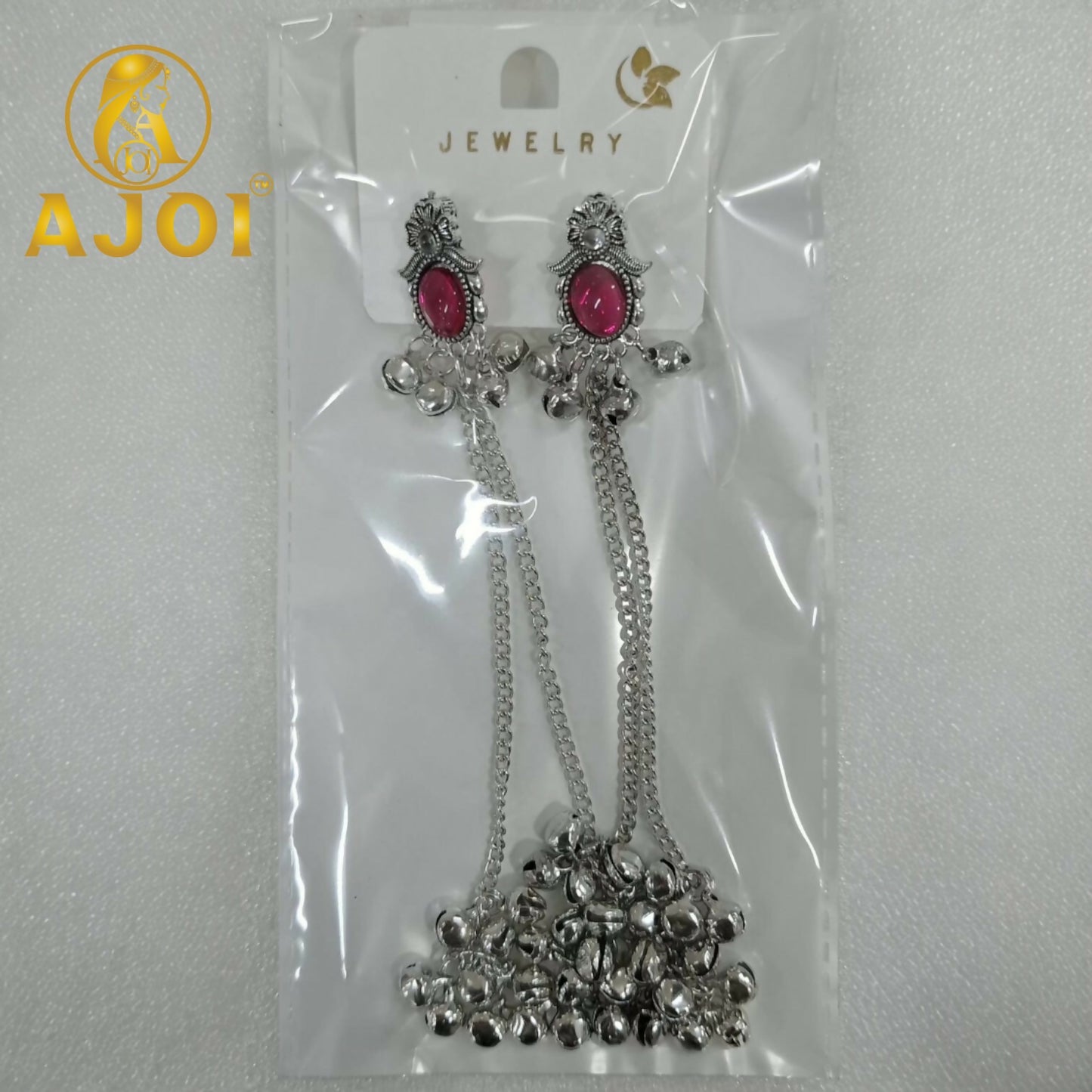 Back view of Kashmiri silver-tone earrings with ruby stone and chain detailing