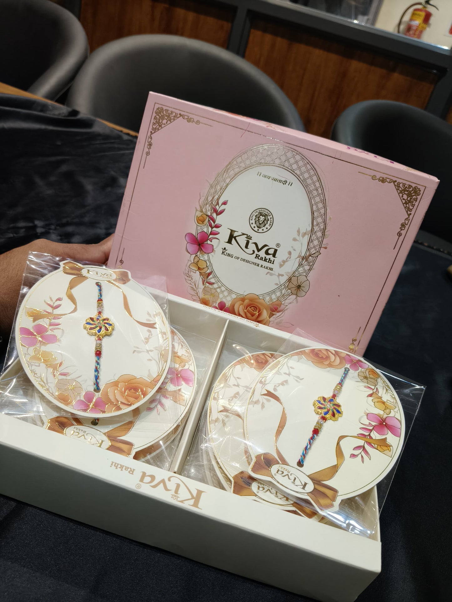 12 Pcs Multicolor Floral Rakhi Set with Decorative Box – Designer Rakhi for Brothers