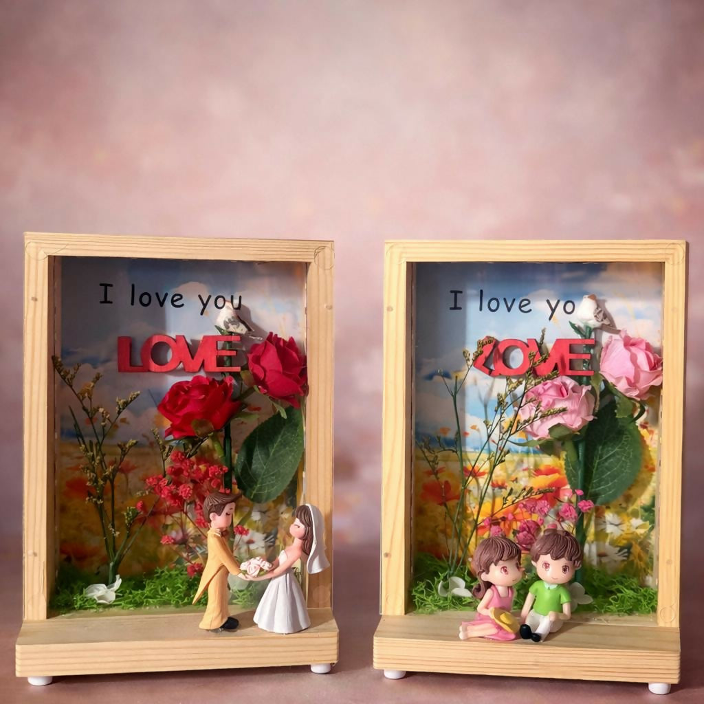 Table showpiece with LED lights showcasing couple figurine design