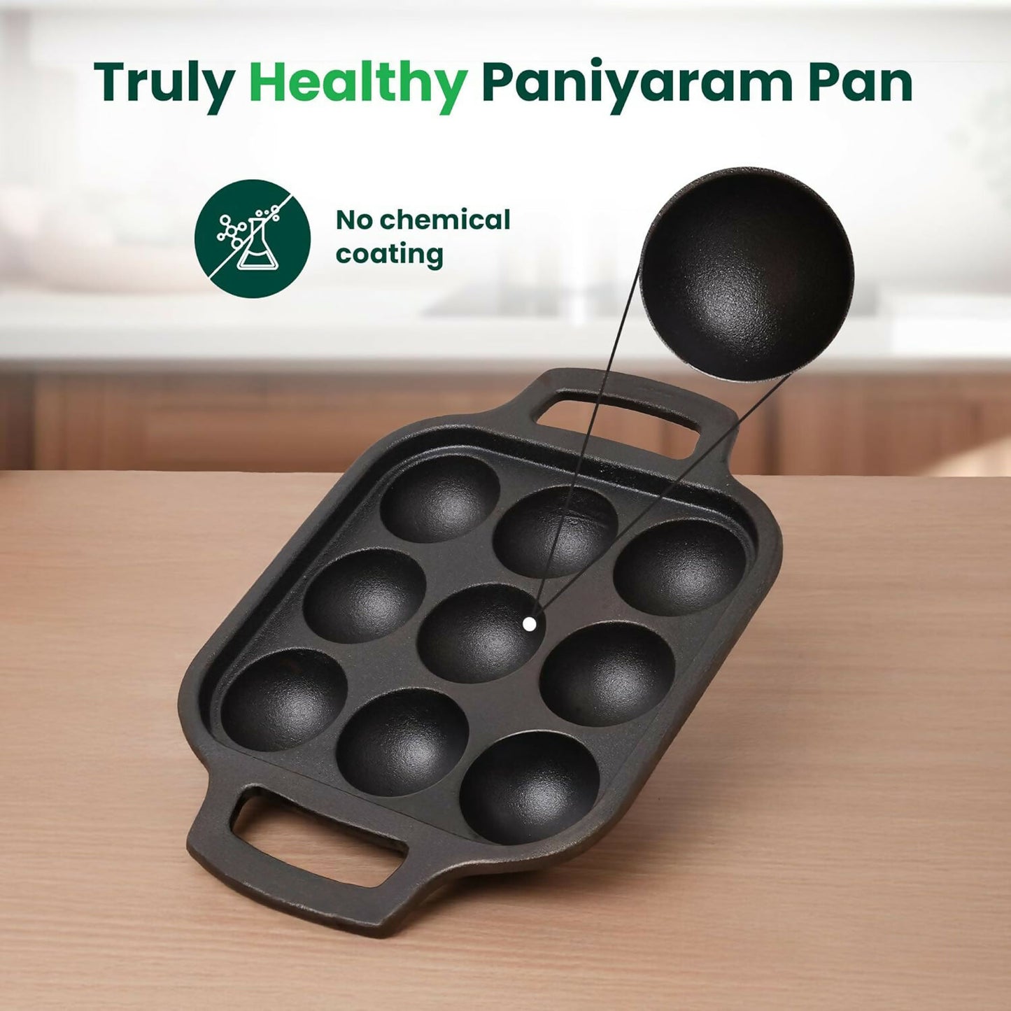 Close up of cast iron appam patra pan cavities