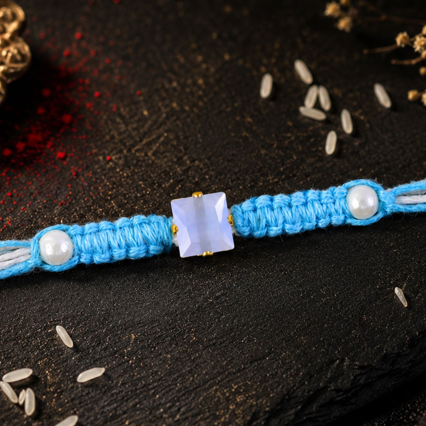 Blue Square Stone Macrame Rakhi with Pearl Beads, Silver Accents and Soft Thread