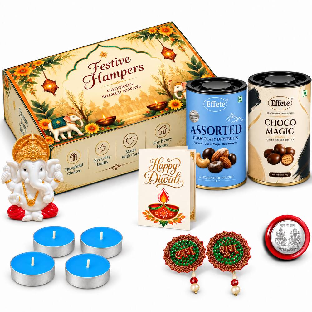 A white Ganesha idol, four blue tealights, two decorative hangings, a silver coin, two chocolate tins, and a greeting card