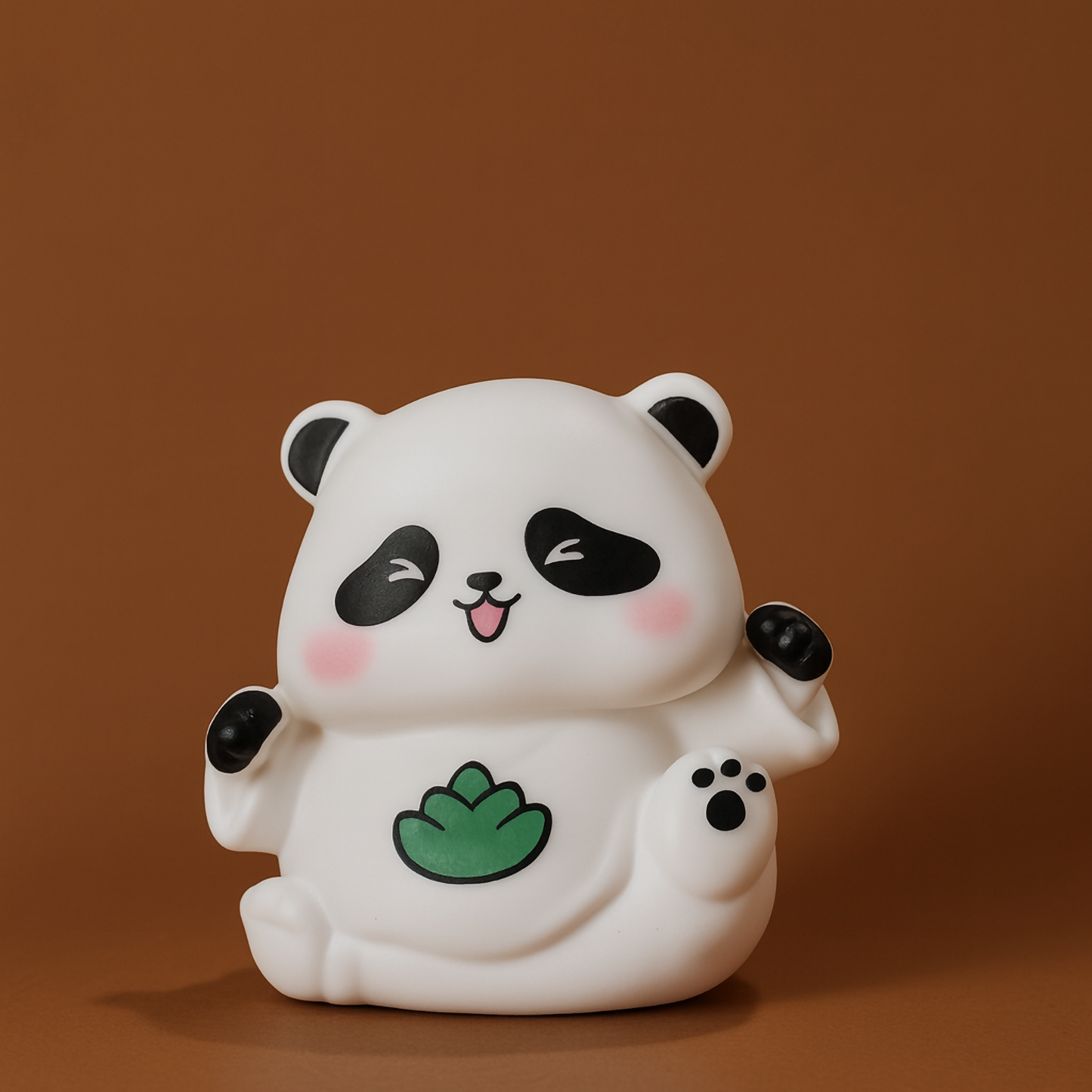 Small panda decorative toy showing side view