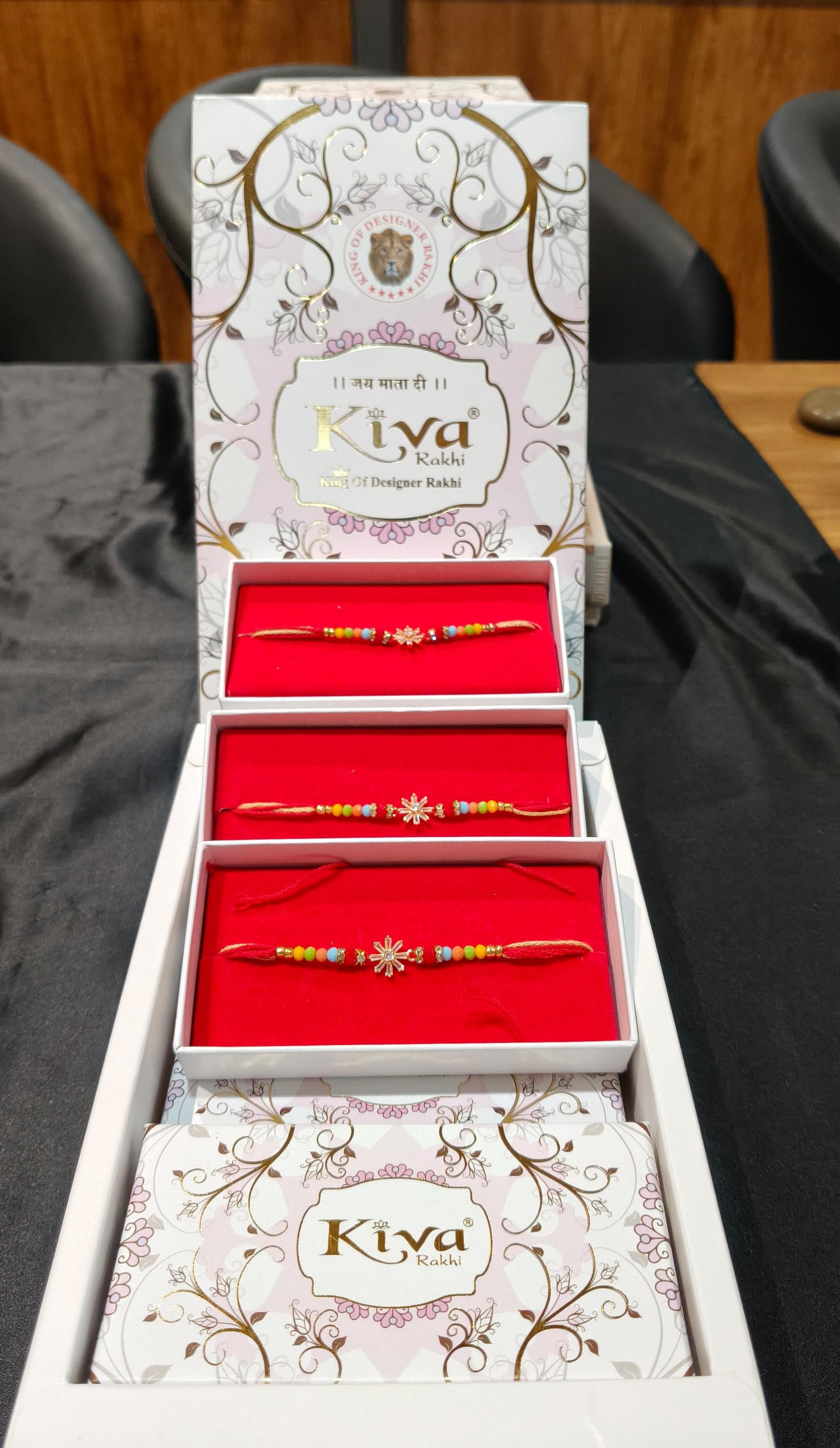 Colorful Beaded 12 PcsRakhi with Crystal Floral Center – Trendy & Festive Design