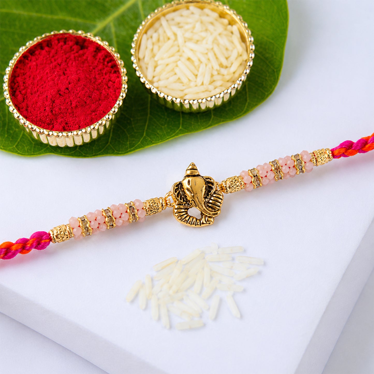 Silver Tone Designer Rakhi with Pastel Beads and Elegant Bracelet Style Finish