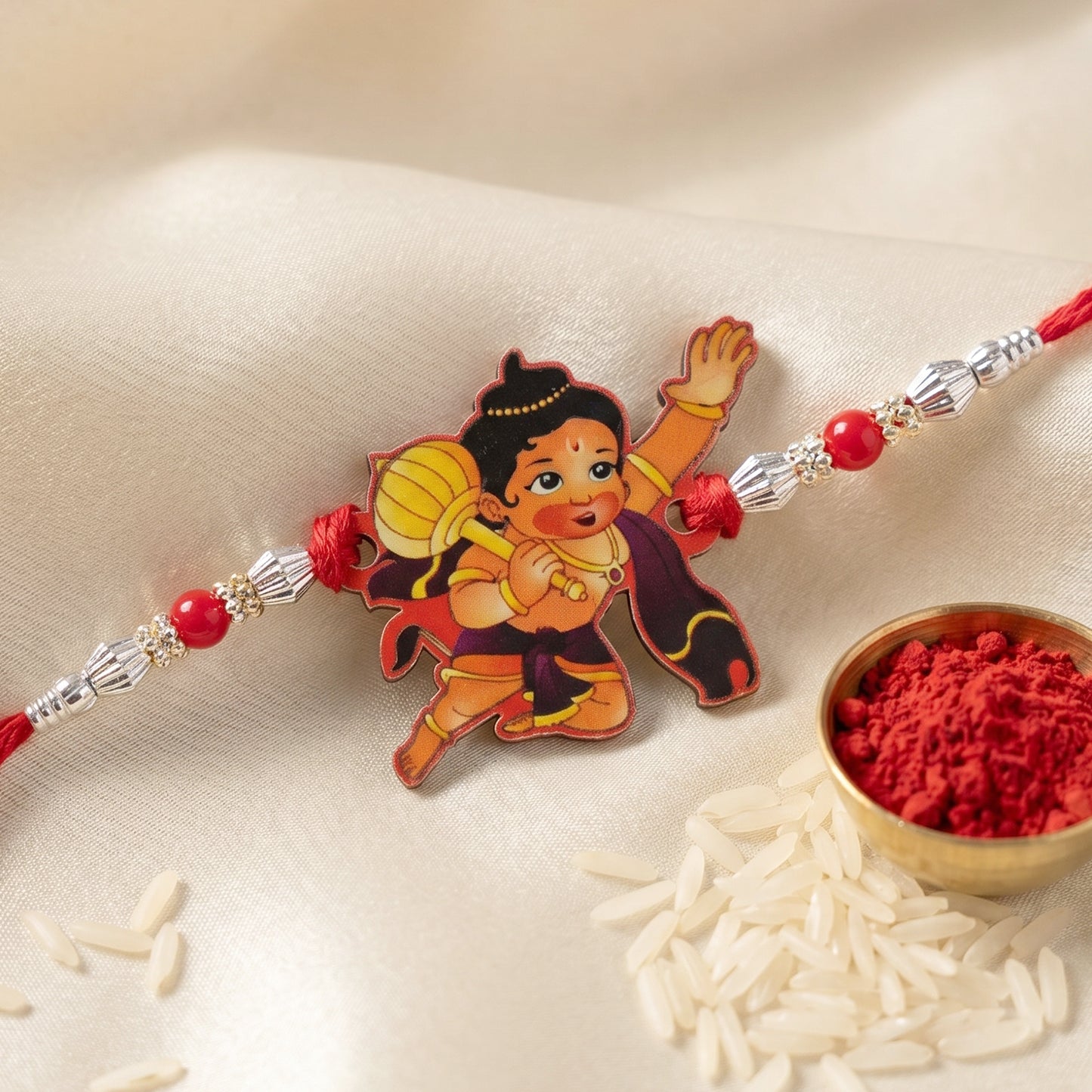 Bal Hanuman Cartoon Rakhi with Red Beads and Silver Chain