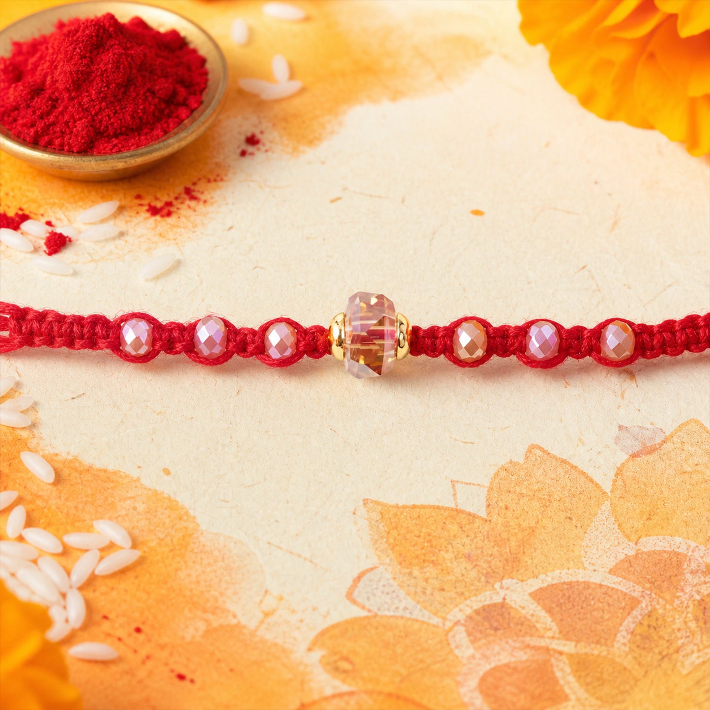 Red Beaded Rakhi with Champagne Crystal Bead and Red Bead Accents