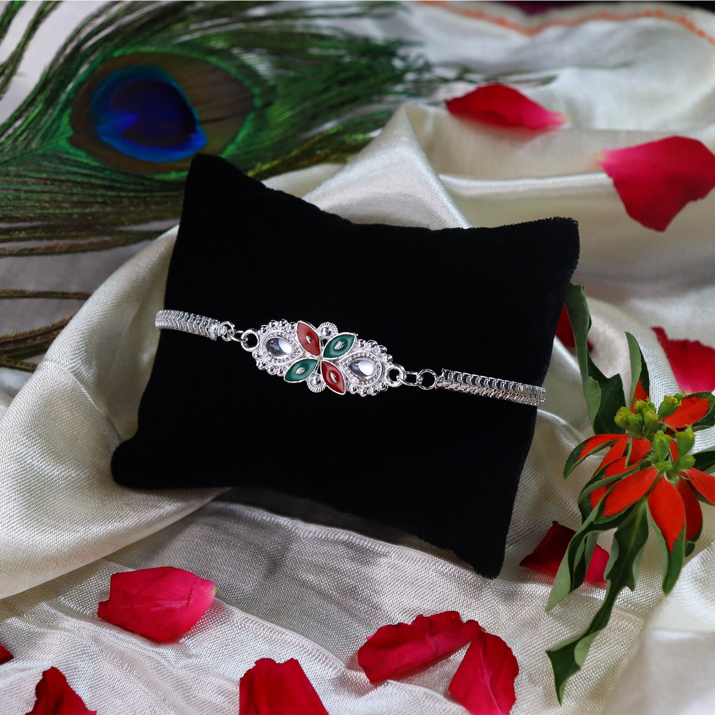 Elegant Floral Rakhi with Red-Green Enamel Work and Metal Chain