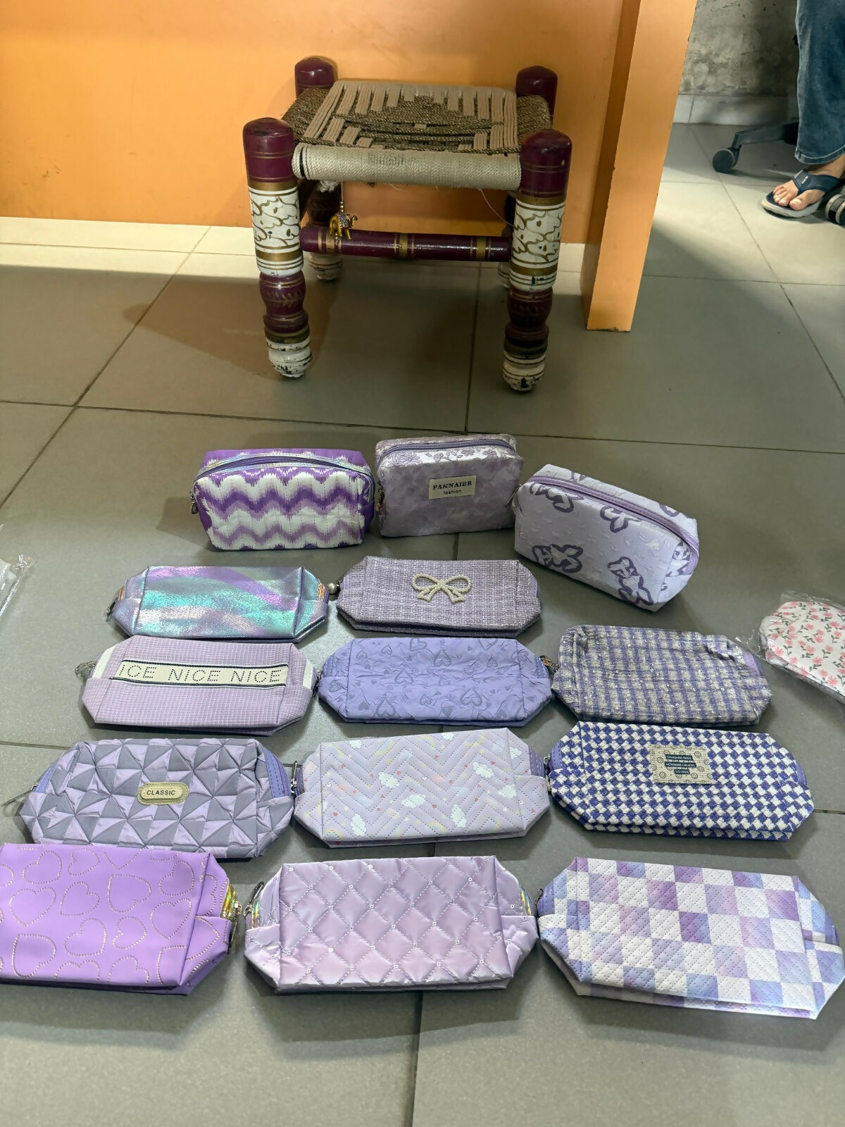 Purple multipurpose organizer pouch displayed on white background