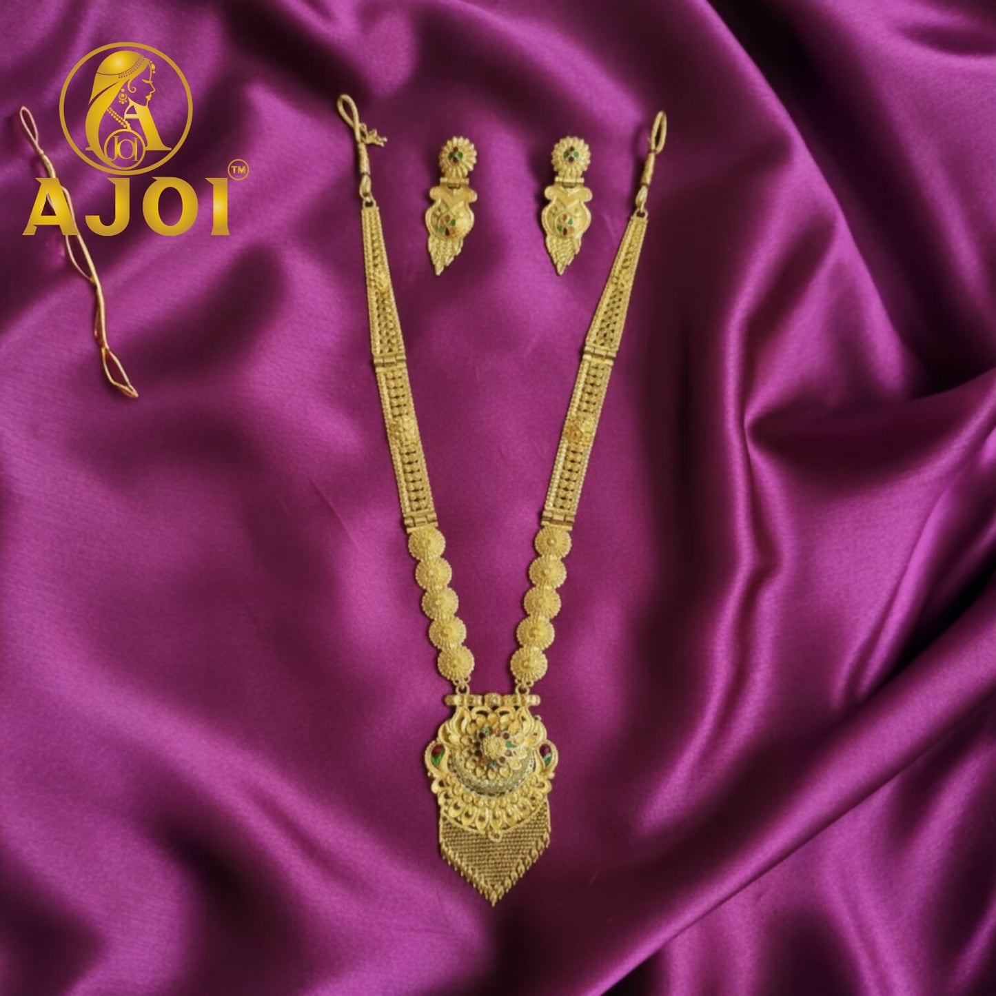 Royal Glow long necklace set with gold-tone filigree pendant and tassel fringe