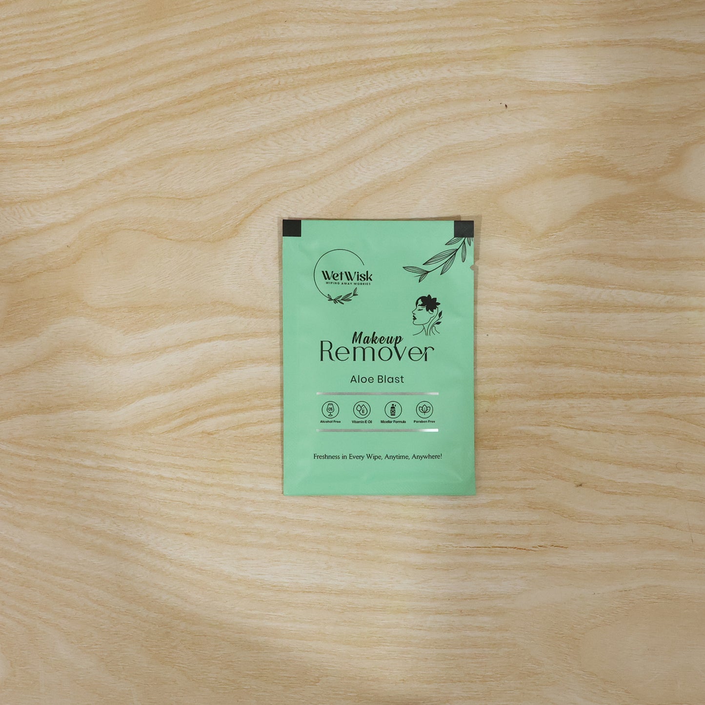 Makeup remover wipe in use