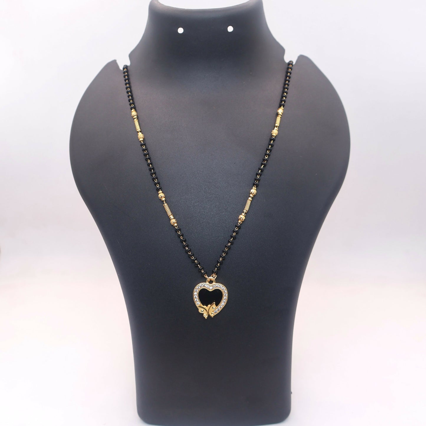 Traditional black bead chain with gold-toned textured spacers for Mangal Sutra necklace