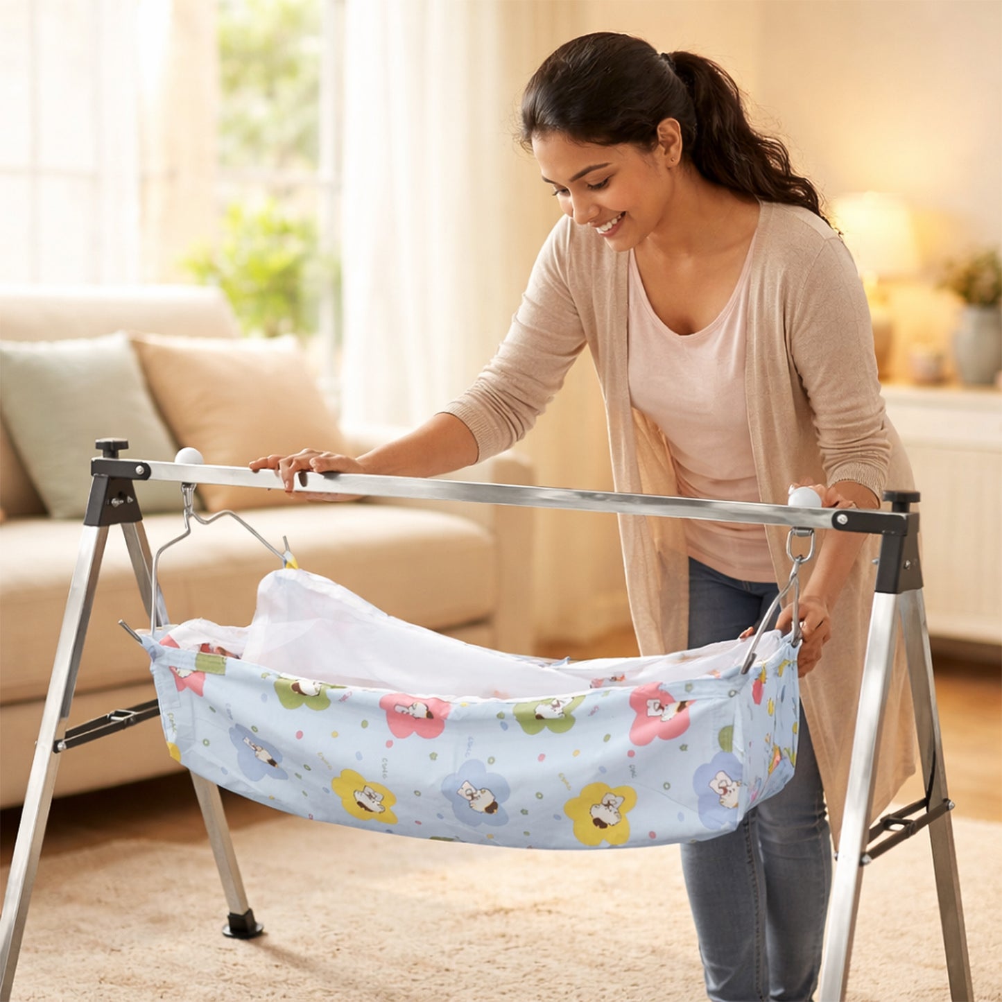 Foldable metal stand supporting a cozy baby hammock cradle