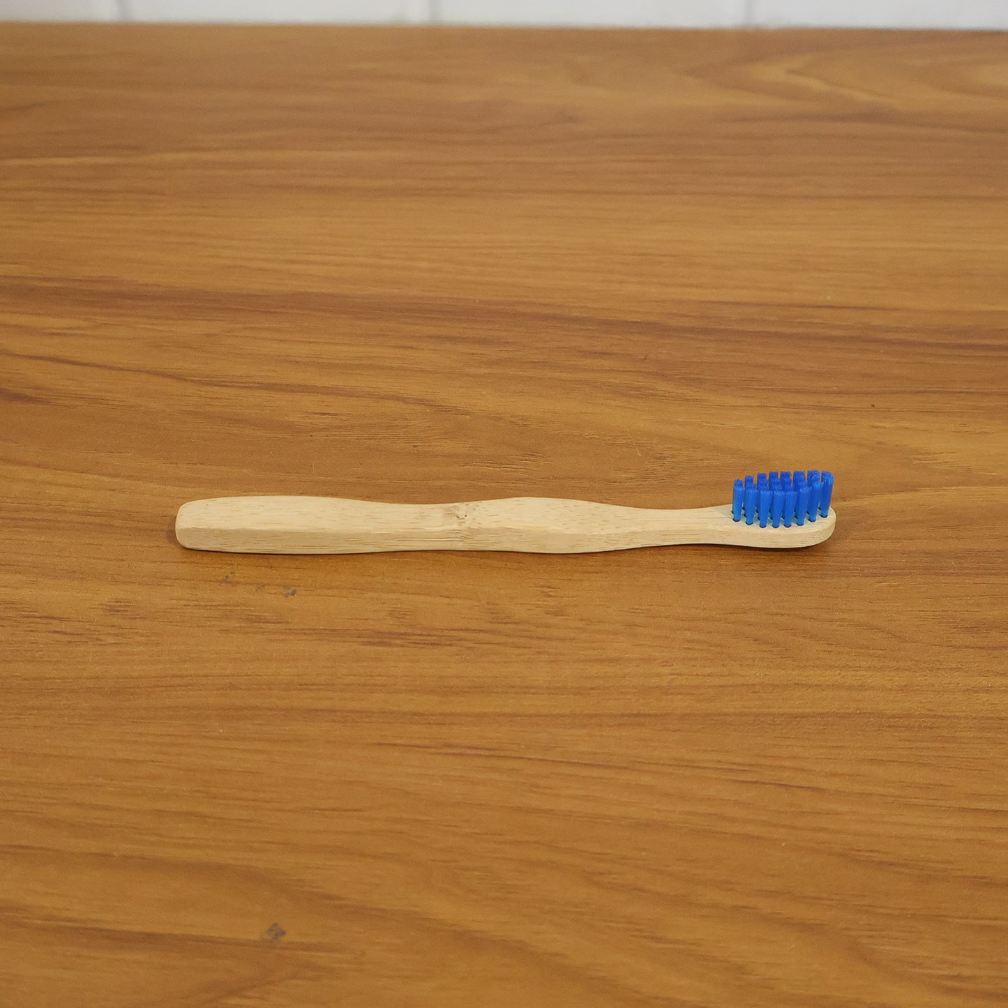 Wooden toothbrush in natural setting