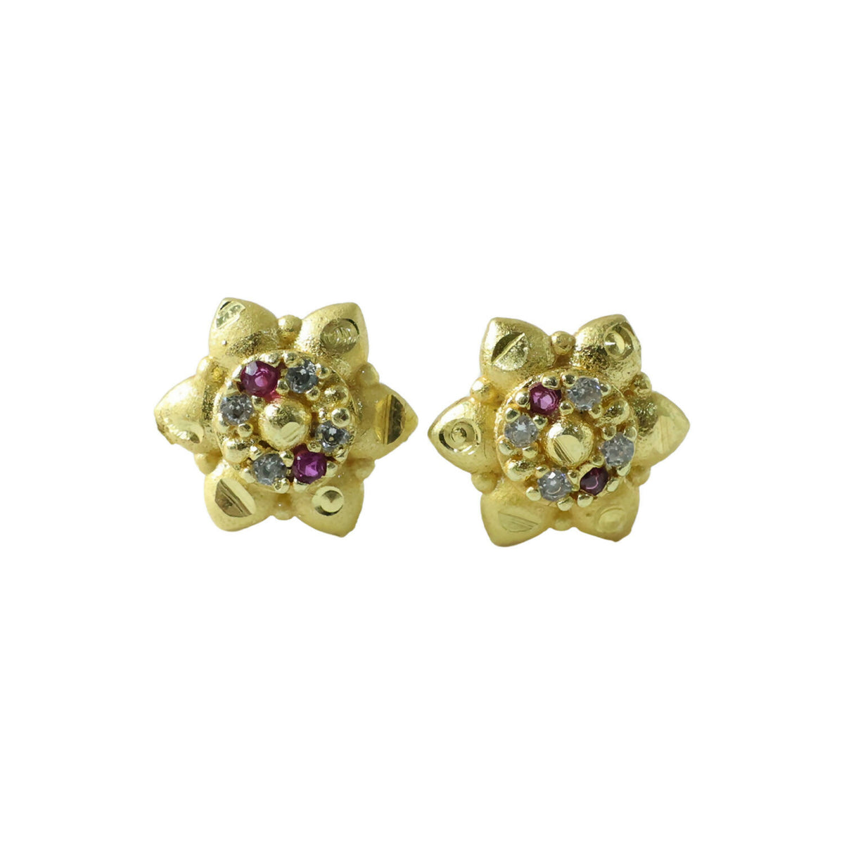 Sparkling decorative stones on traditional floral gold stud earrings
