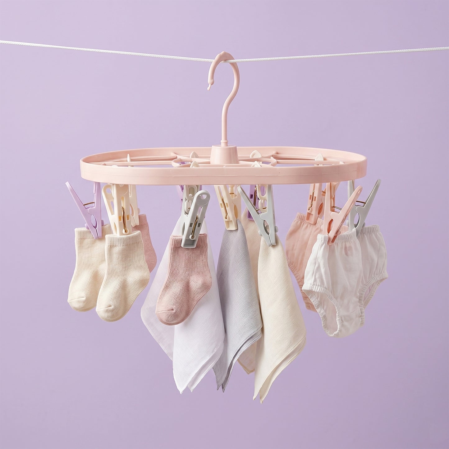 Strong spring-loaded plastic clips ideal for trousers, towels, and clothing accessories