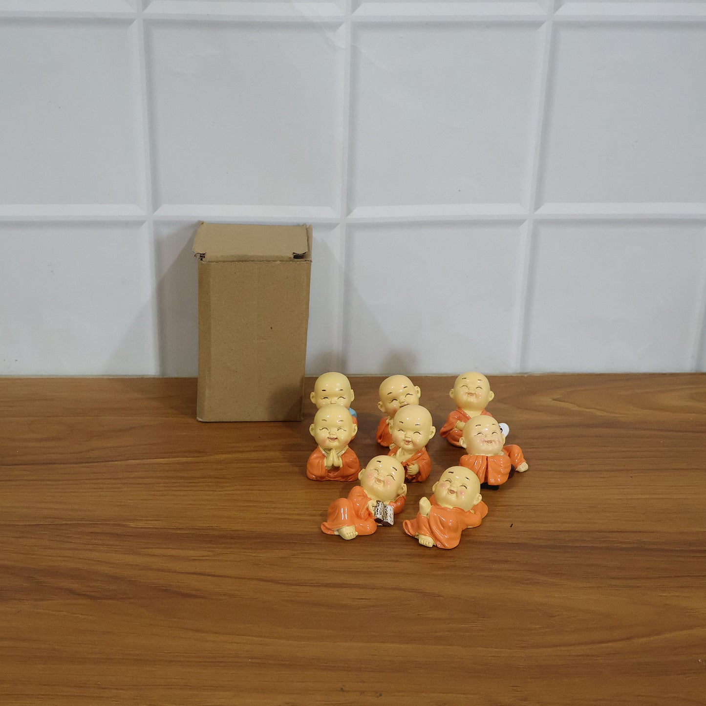 Mini Monk Buddha Idol Set – 8 Joyful Laughing Figurines