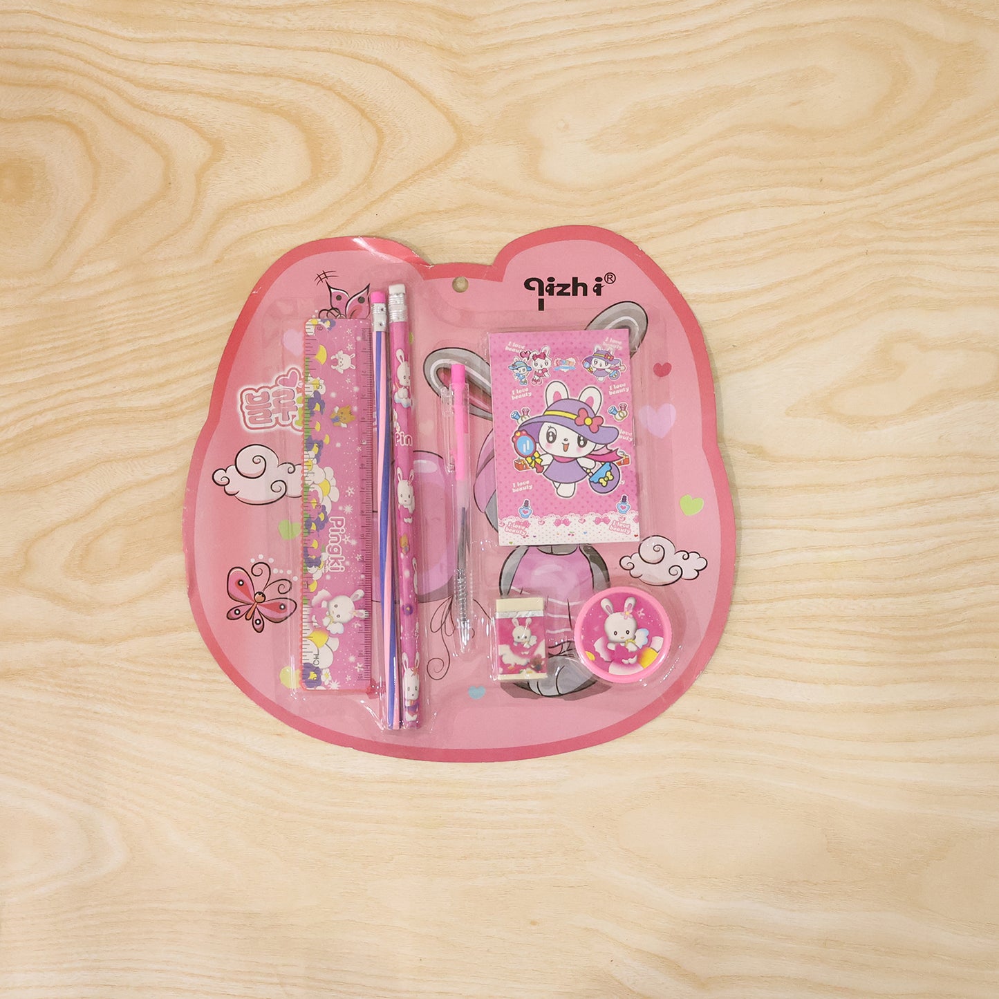 Pink kids stationery set displayed with all items