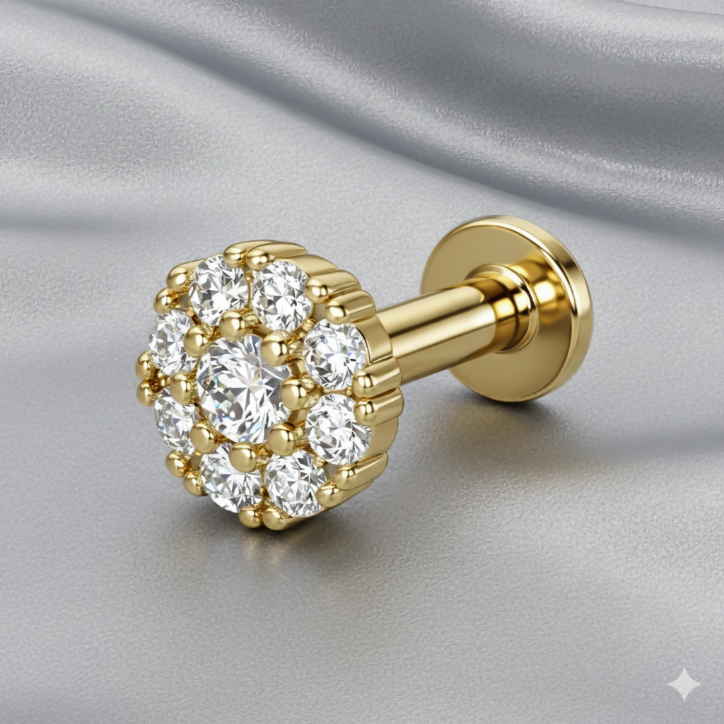 Close-up of gold flower stud earring showing delicate pleated design