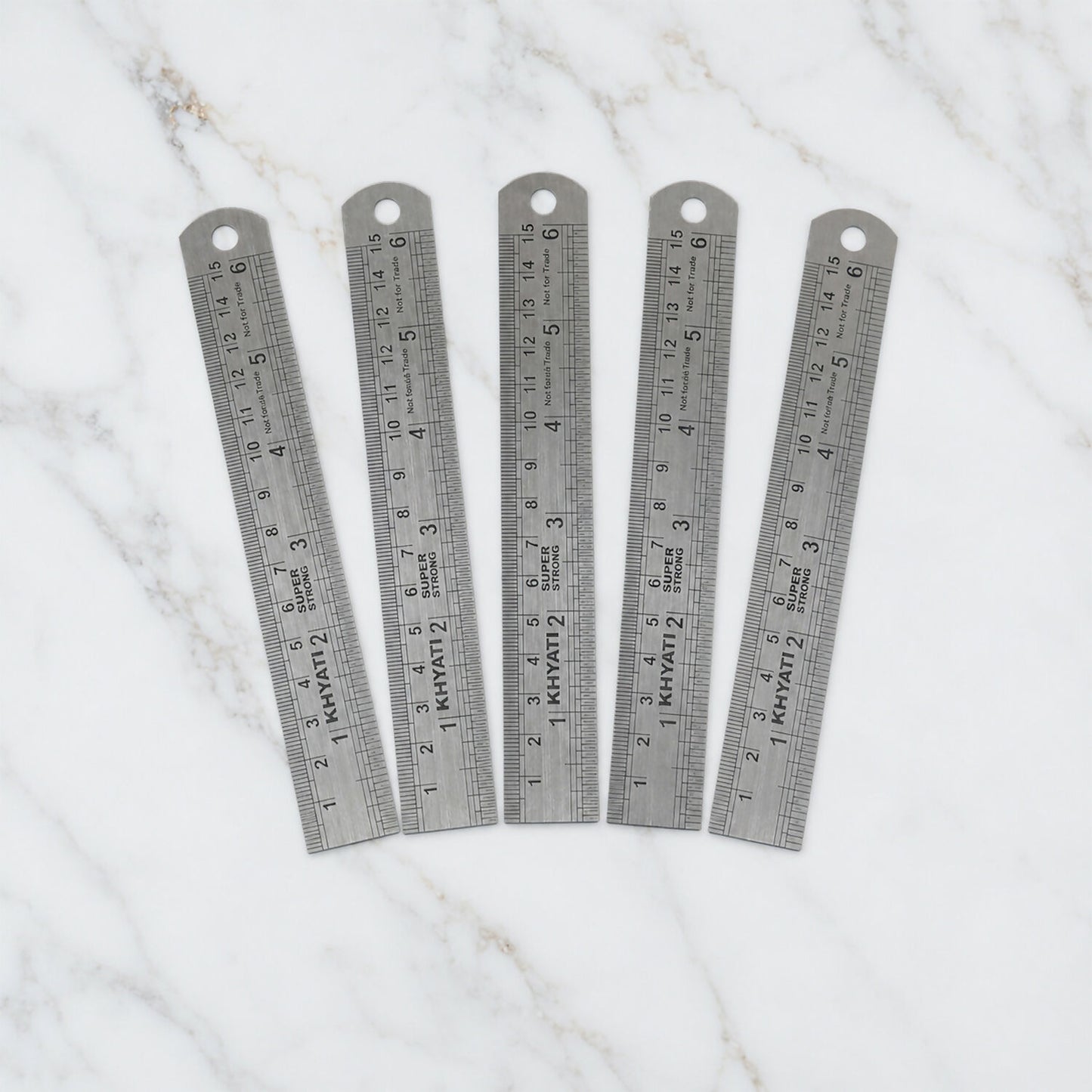 Close-up of etched measurement markings on Khyati ruler