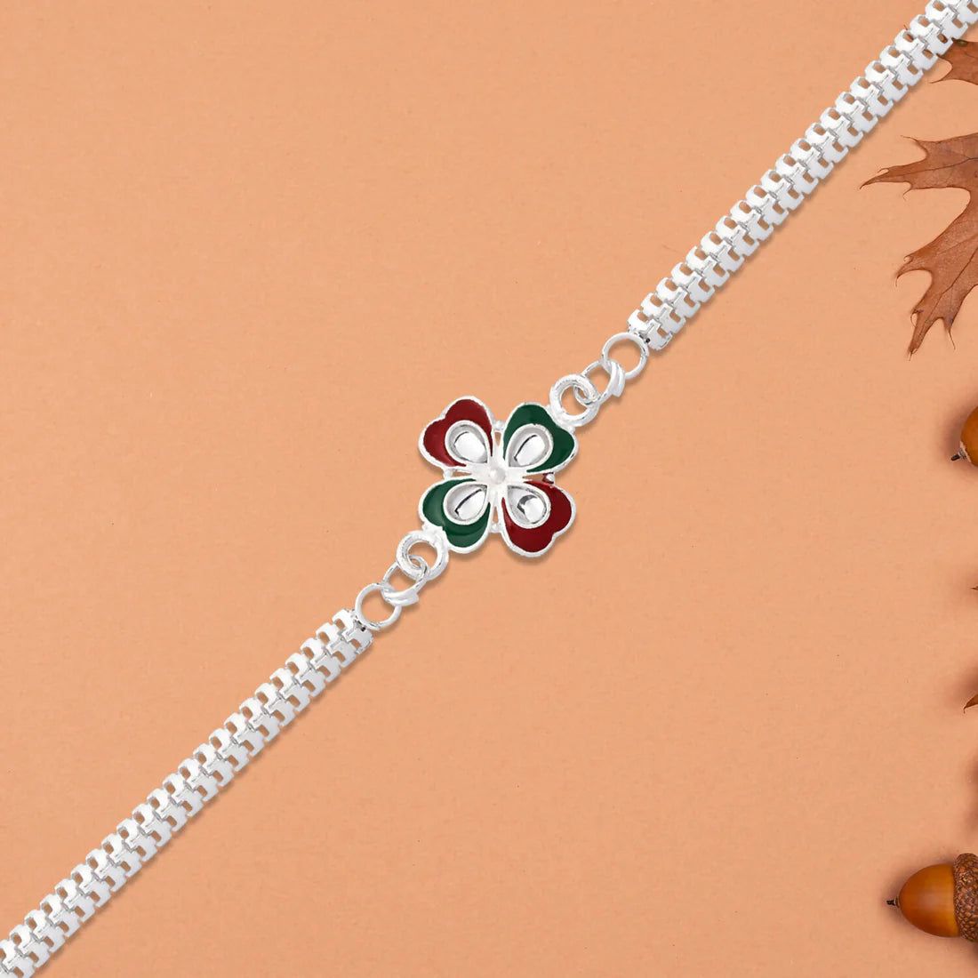 Traditional Rakshabandhan Rakhi with vibrant enamel work and durable chain.