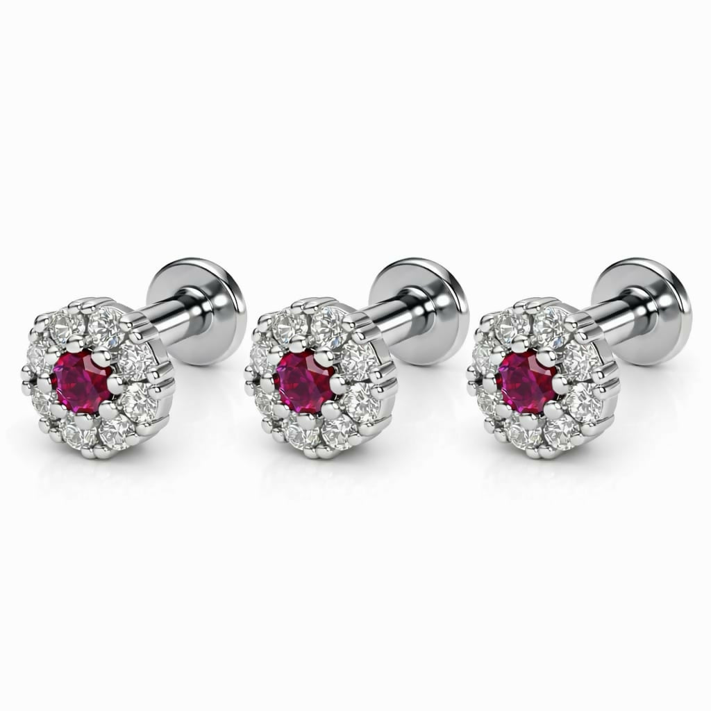 Combo pack of three silver plated ruby flower flat back stud earrings displayed elegantly