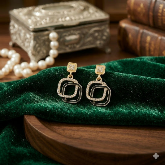 Black stone gold plated geometric drop earrings front view