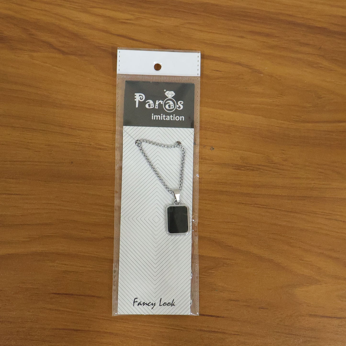Model wearing premium men's stainless-steel black pendant chain necklace