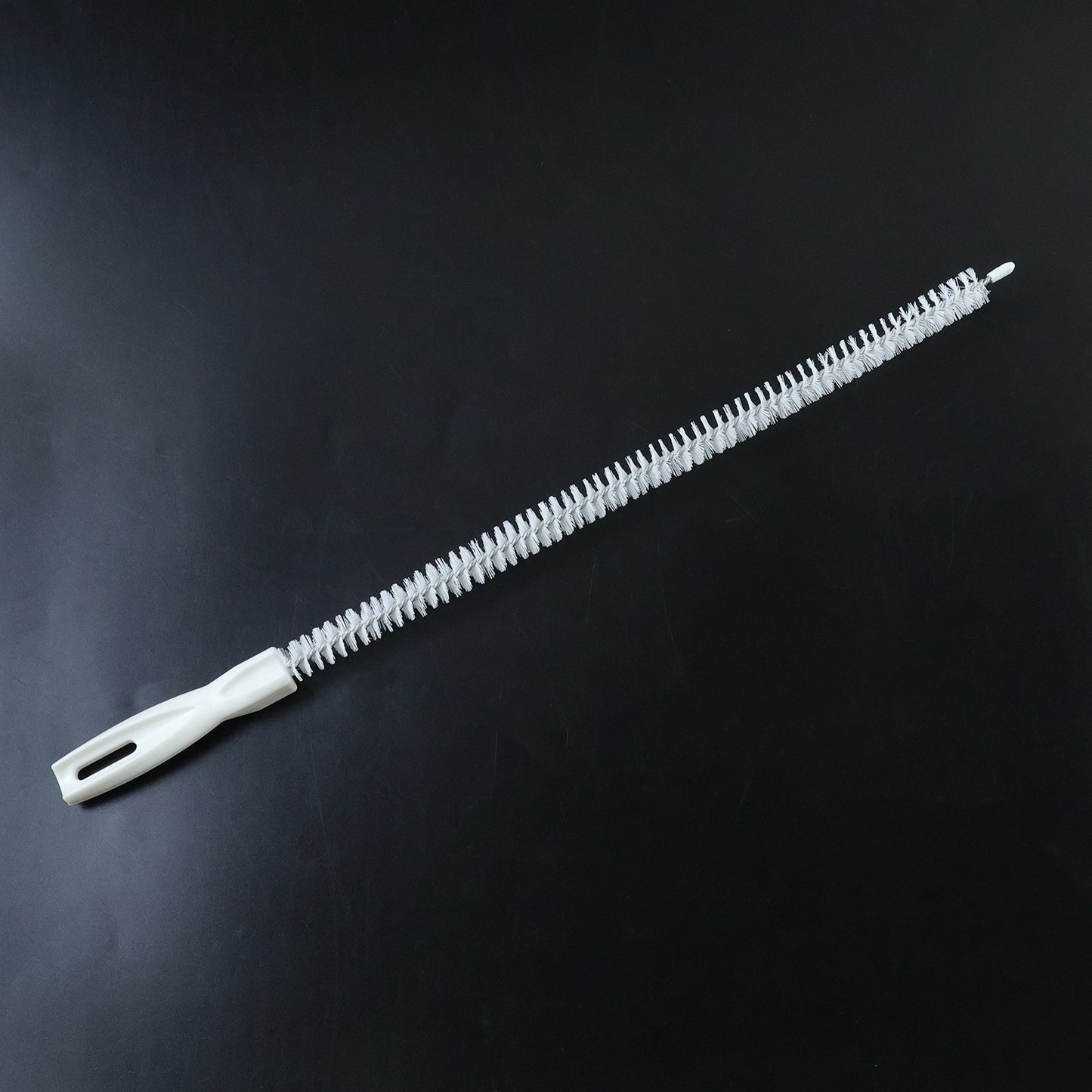 Flexible long brush used for cleaning sink drains