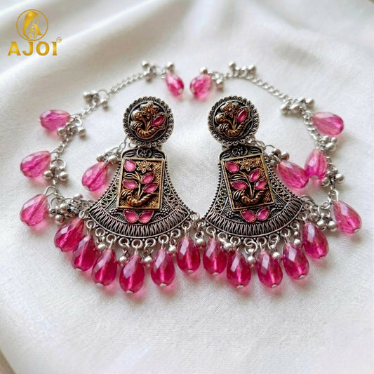 Traditional oxidised floral chandbali earrings with rani pink crystal drops