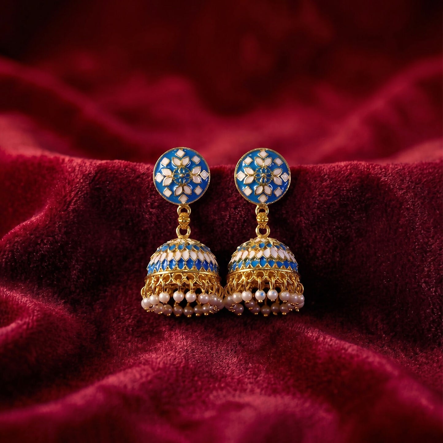 Blue round stud jhumka earrings with pearl hangings, detailed view