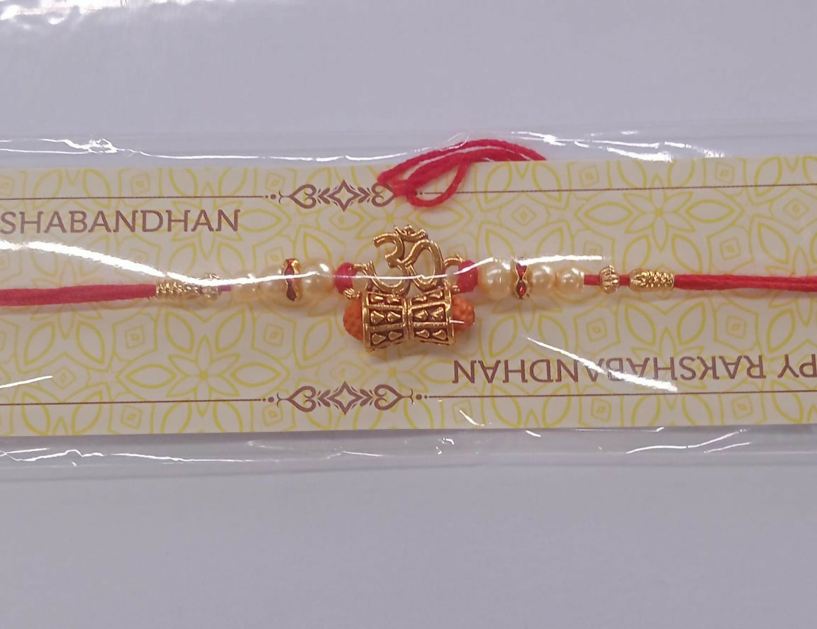 Golden Charm Rakhi detailed view