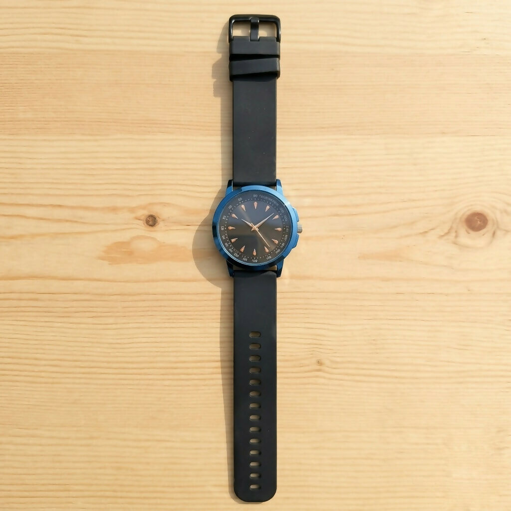 Blue bezel watch with sunburst dial and three hands