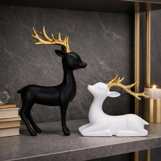 Black and white deer showpiece set with golden antlers - standing and resting figurines