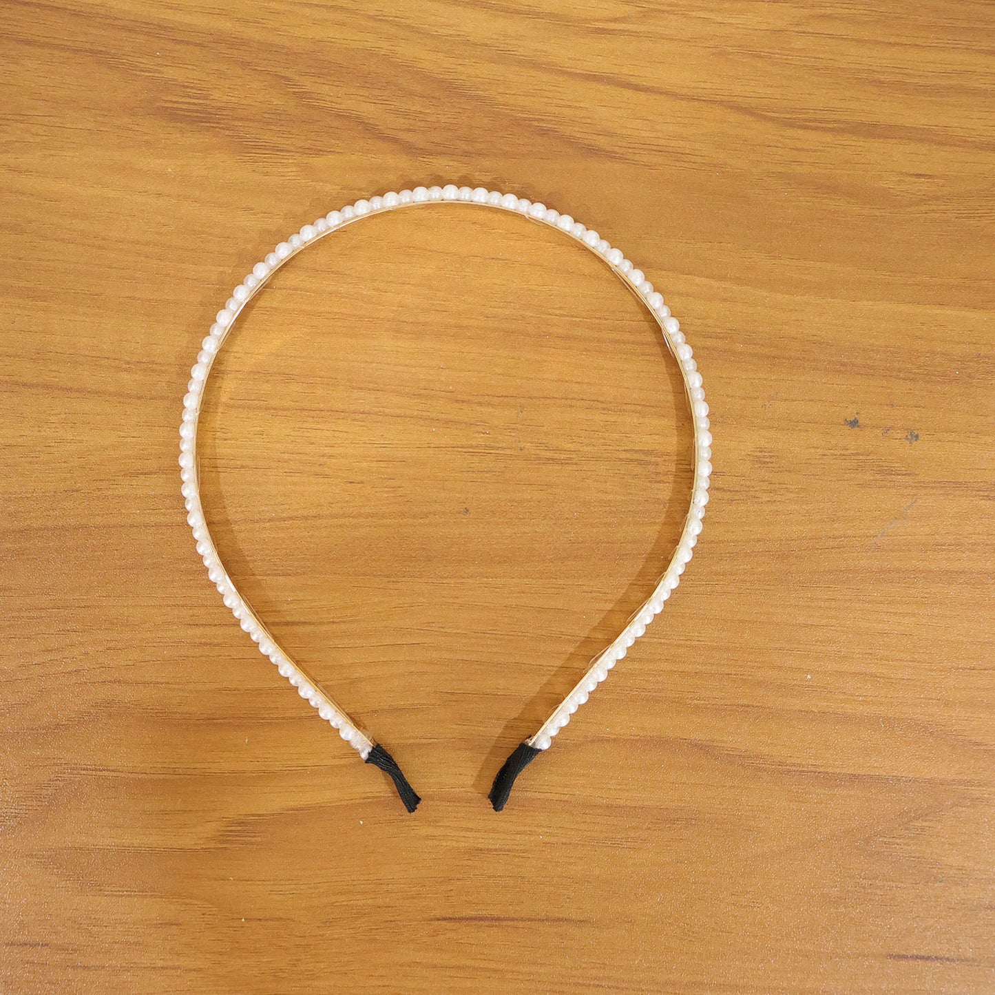 Fashion pearl embellished hair accessory