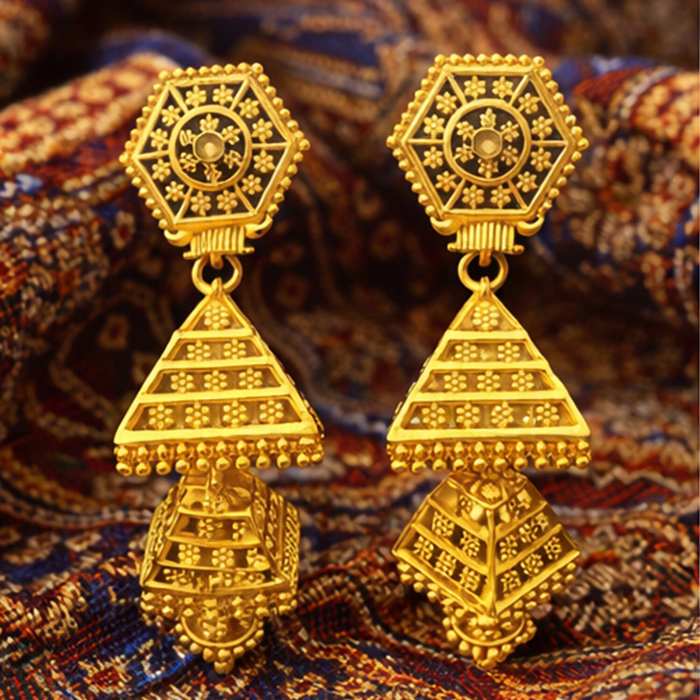 Side view of intricate ethnic jhumka earrings with hexagon motif and pyramid danglers