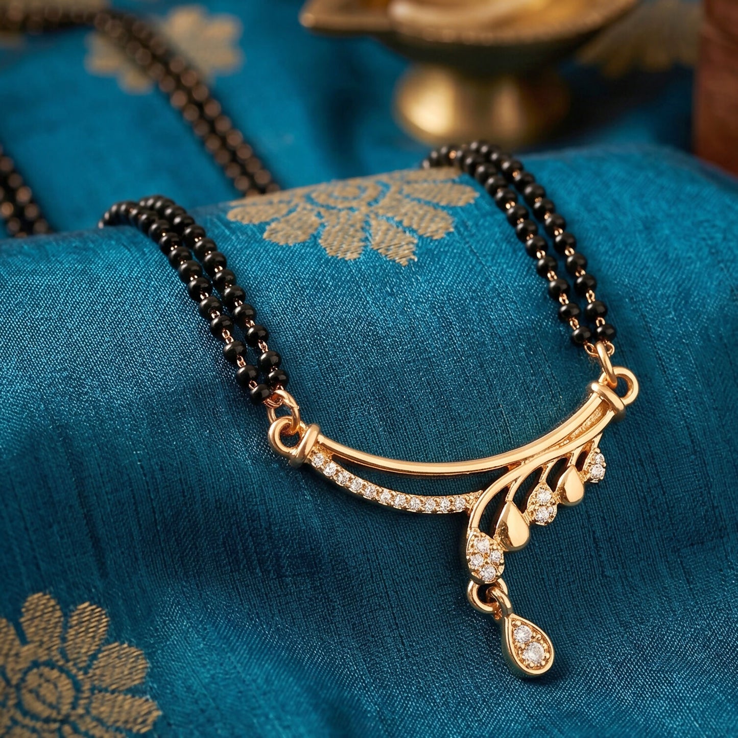 Stylish rose gold mangalsutra for festive occasions, detailed pendant with CZ stones