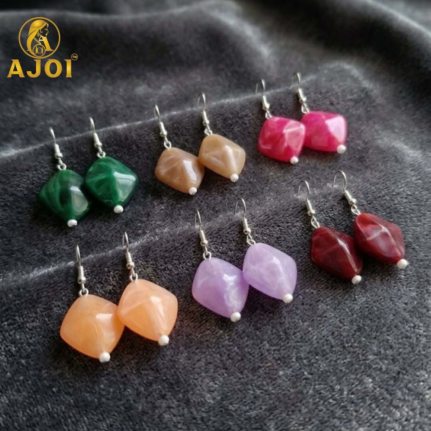 Geometric drop earrings with green and peach stones