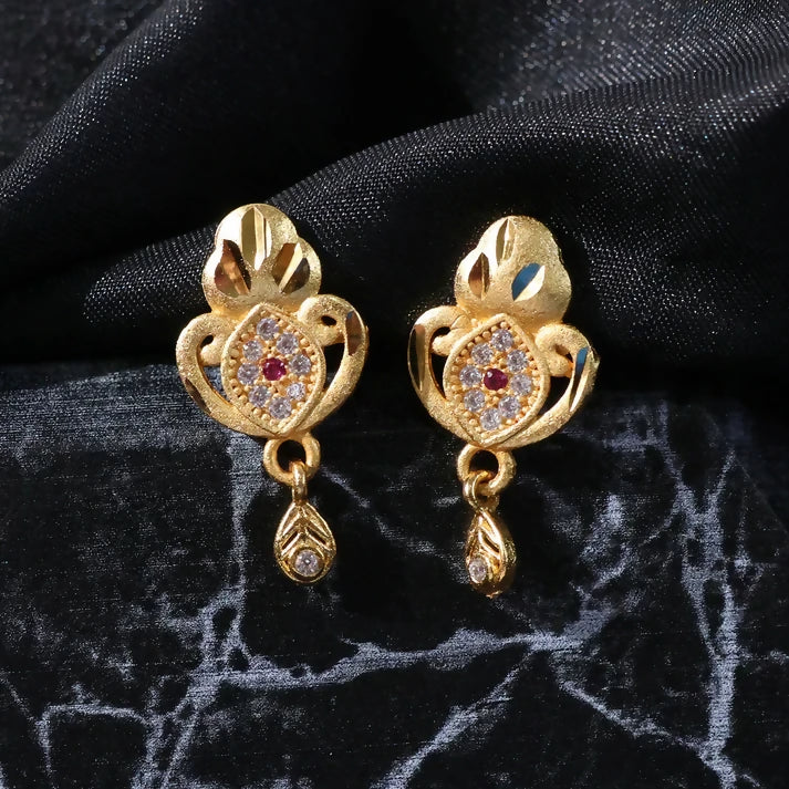 Ethnic Floral Motif Gold Stud Earrings With Stone Center And Elegant Drop Finish